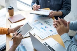 business team meeting working analyzing with financial data and marketing business strategy project e1669254582711 1